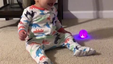 Baby Belly Laughs Over A Ball