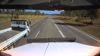 Small Truck Undertakes on Shoulder