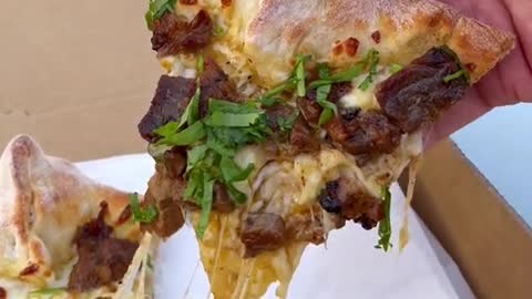 Would you eat this cheesy Carne Asada Pizza Got this delicious pizza from