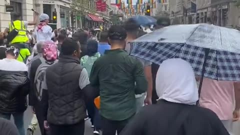 Islamist extremists screeching ‘Allahu Ackbar’ while on a street with ‘Pride’ flags