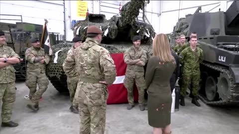 British PM Sunak serves Christmas meal to NATO troops