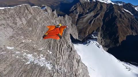RidgeMonster.com Douggs WingSuit pilot flying Eiger Mountain Switzerland & camer