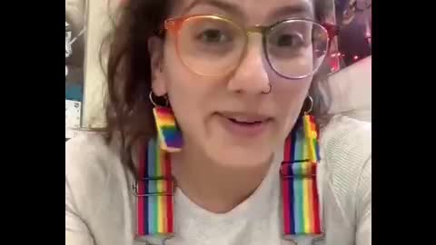 Teacher laughing about having students pledge their allegiance to the LGBT flag.
