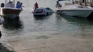 Car Drives into Water at Boat Ramp Almost Sinking Car