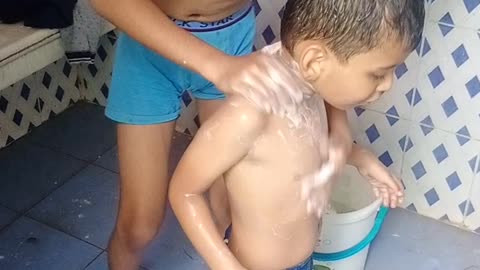 Indian child bath fun