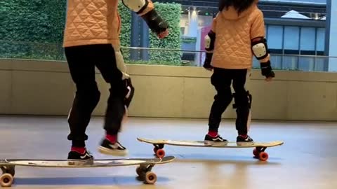 The twins not only look the same, but also practice skateboarding