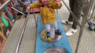 Toddler Has Trouble in Funhouse