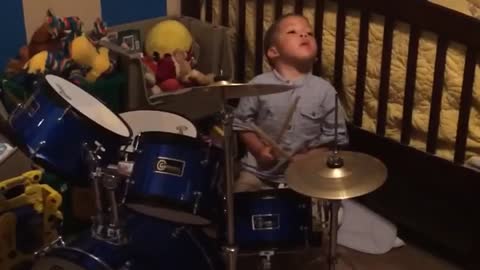Talented toddler plays the drums adorably