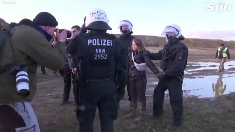 Greta Thunberg arrested by riot police at heated German coal mine protest