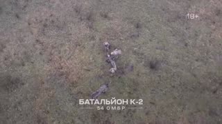 Ukrainian troops firing at a Russian trying to surrender