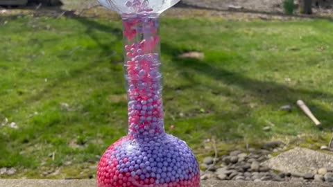 Moving Beads in Glass Bottles -- ViralHog
