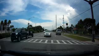 Completely clueless driver pulls into oncoming traffic