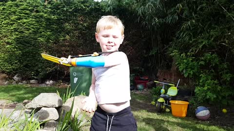 Boy tries his hand at frisbee