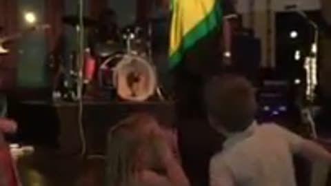 Children dancing to Reggae music in Jamaica