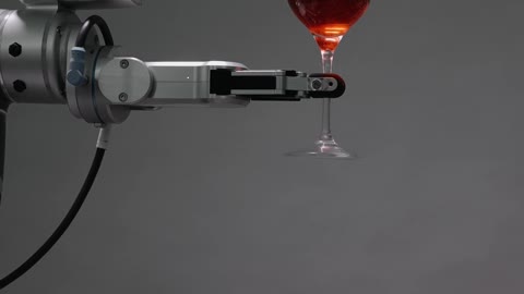 A robot holding a wine glass HD