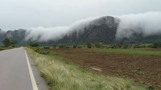 Clouds Climbing Over Mountains