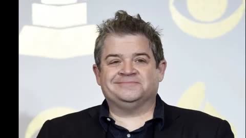 Meredith Salenger, 51, and Patton Oswalt, 52, look happy at the Eternals premiere.