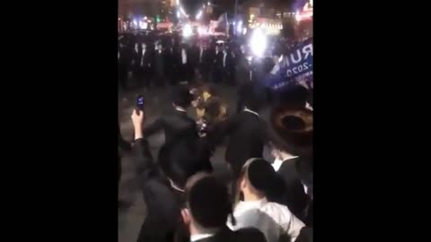 NEW YORK: Orthodox Jews in Brooklyn dance to music with Trump flags in protest of synagogue closures
