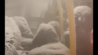 Snow Storm Strands Passengers in Bus
