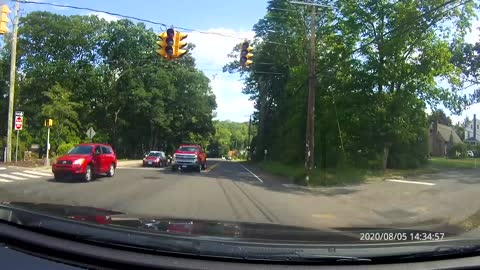 Cars blast through out of order traffic lights caused by major storm