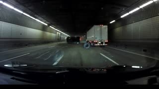 Truck Tips Over in Traffic Filled Tunnel