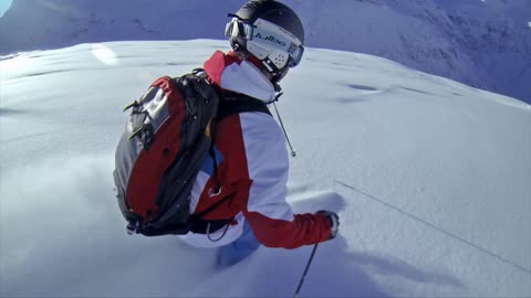 Freeskiing / powder skiing after sunrise in Austria (untouched powder)