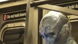 Guy in silver blue alien makeup