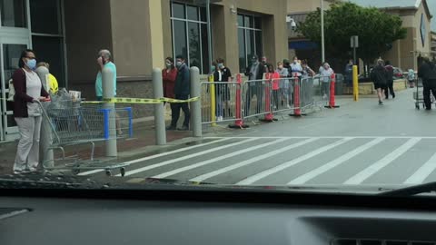 Lined up at Walmart to shop during Covid