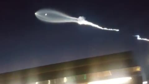 Rocket Launch Forms Bright Clouds in Night Sky