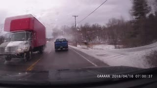 Snow and Ice Flying Off Truck Smashes Windshield