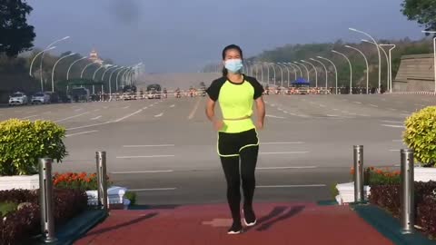 Woman Unknowingly Does Aerobics Class as Military Coup Occurs Behind her in Myanmar