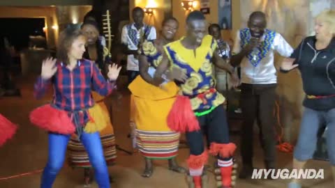 Whites dances Tooro Kingdom's Cultural Dance in Uganda