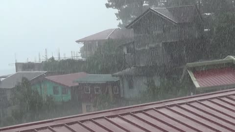 Heavy rain in a small town.