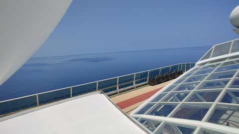 Standing on top a cruise ship