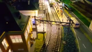 night scene of a model train layout