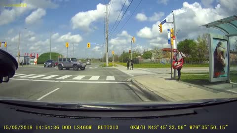 Speeding Guy Looses Control When Running The Red Light