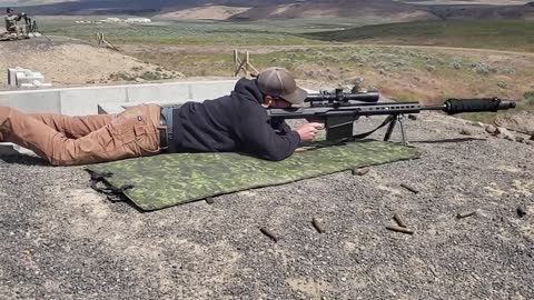 Shooting Suppressed Barret 50 cal.