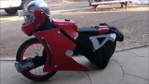 Boy 'Transforms' Into A Motorcycle With His Halloween Costume