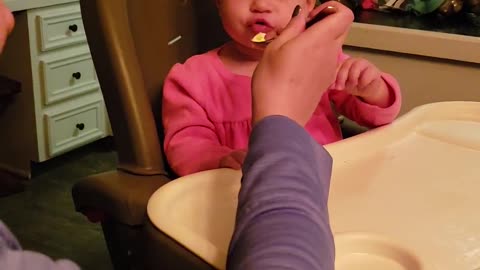 Baby girl tries eating ice cream for the first time