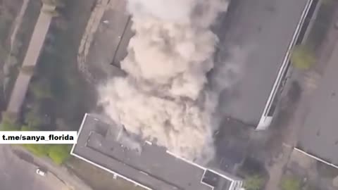 A Russian drone watches a planning bomb hit a building in Sumy.