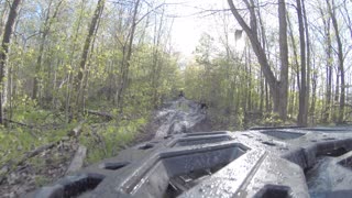 ATV through Mud in Forest