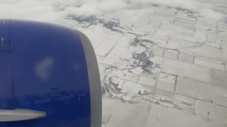 Flying into Chicago above snow