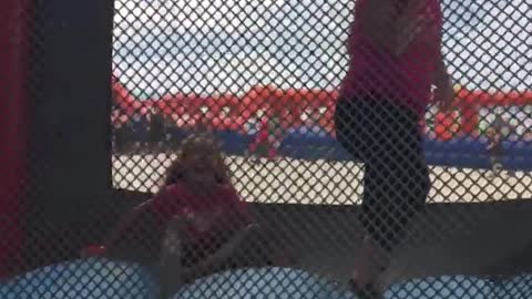 Boy spins on bouncy house fail