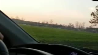 Deer Clears Moving Car at Full Speed