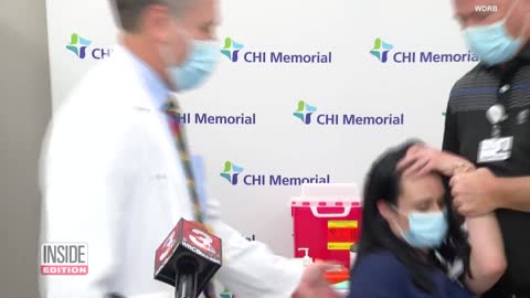 Nurse Faints While Speaking to Reporters After Getting Vaccine HD