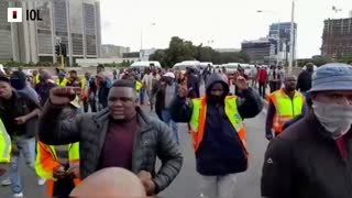 Protesting taxi drivers march in Cape Town CBD