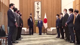 John Kerry visits Japan to discuss cutting emissions