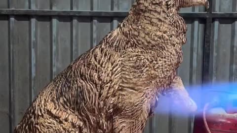 "Masterpiece in Wood: Handcrafted German Shepherd Dog Statue Creation"