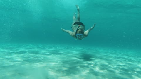 Bikini girl swimming in the sea