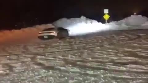 Lamborghini drifts hard in the snow